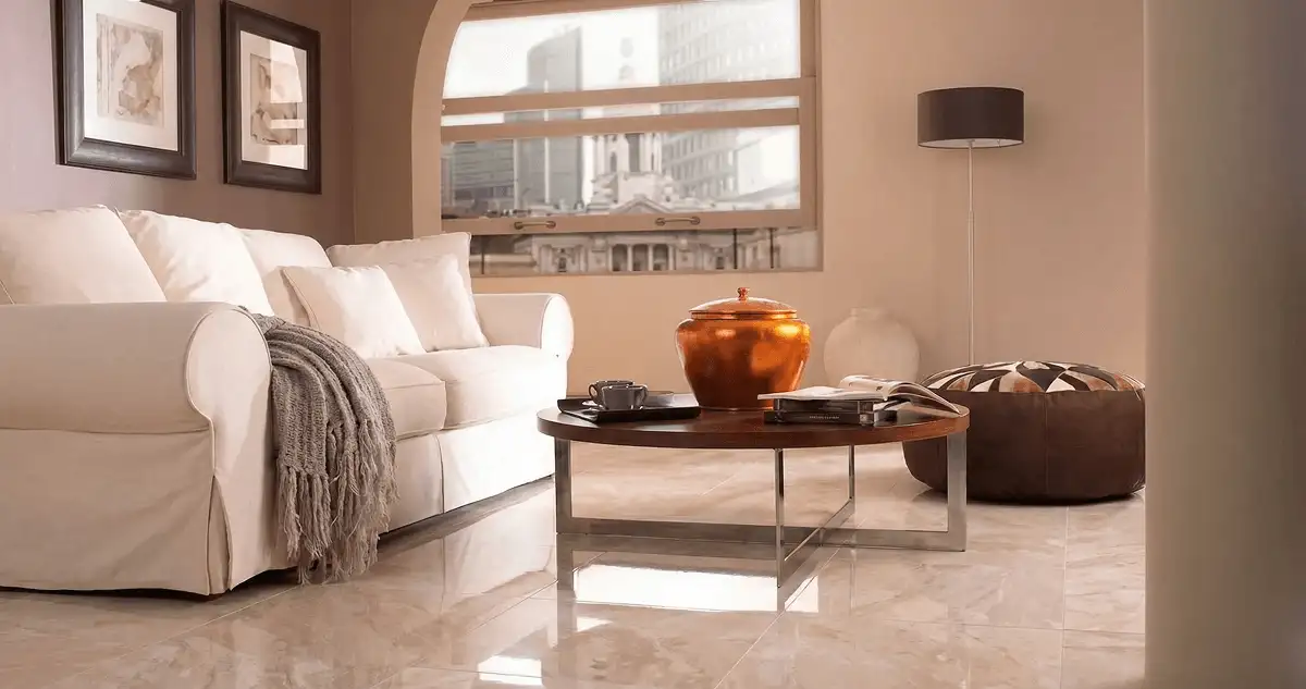 Modern living room with professionally installed marble flooring, a beige sofa, coffee table in Oakland, CA