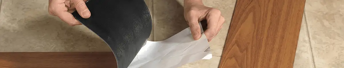 A professional installing vinyl flooring in Oakland, CA